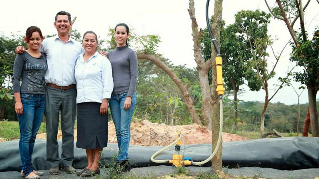 farmers and a biodigester